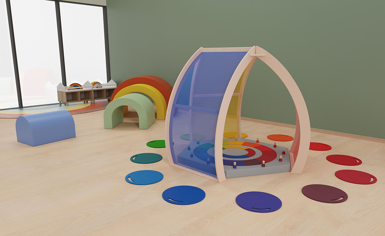 Gruppenraum Regenbogen Ausschnitt mit Farbtempel, Regenbogensitzmatten, Betzold Regenbogen Kriechtunnel und Betzold Regenbogenteppich