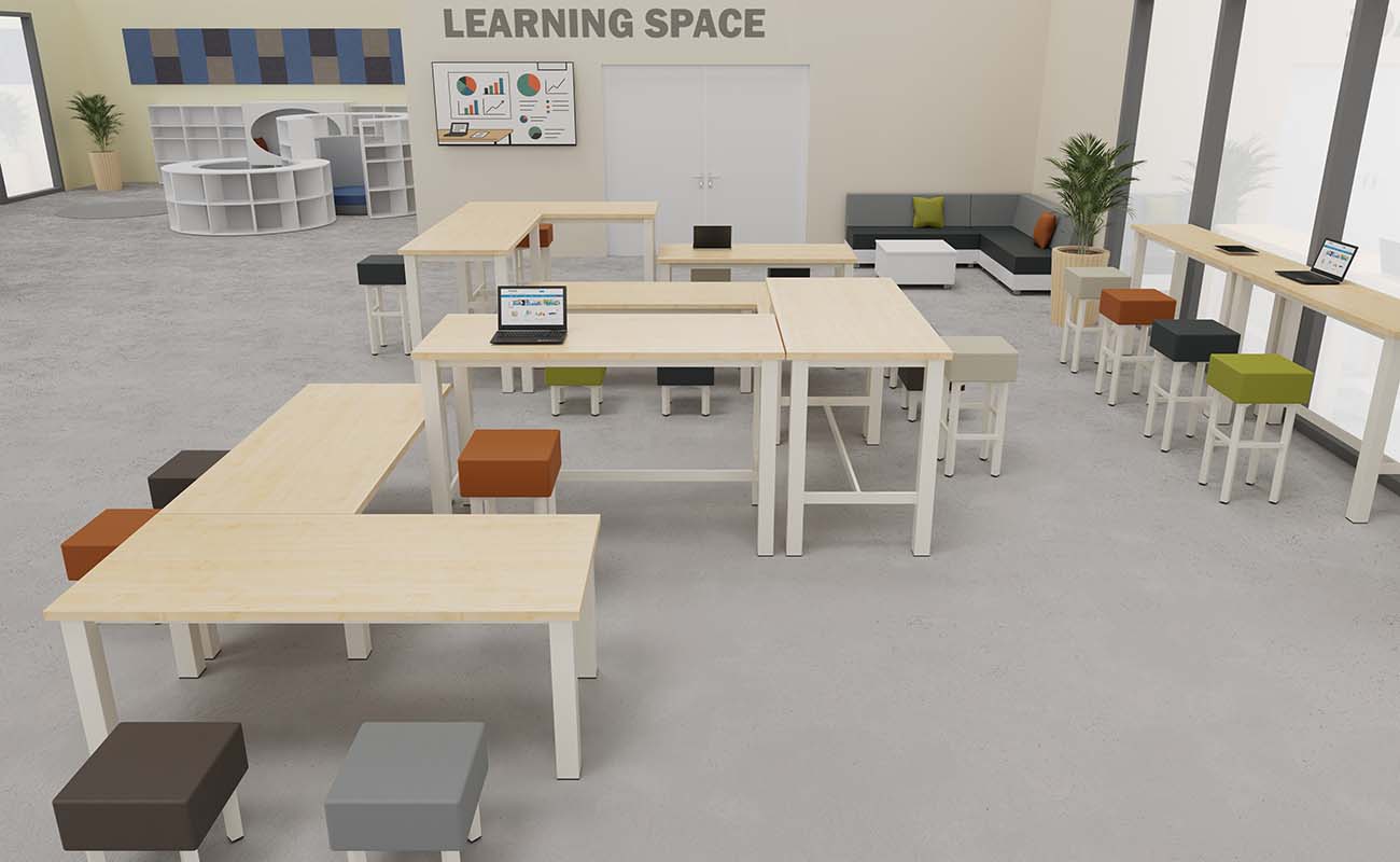 Co-Learning Space LernAtelier Ausschnitt mit essBar Hochtischen, Hochhockern und Lesetreff Möbel im Hintergrund