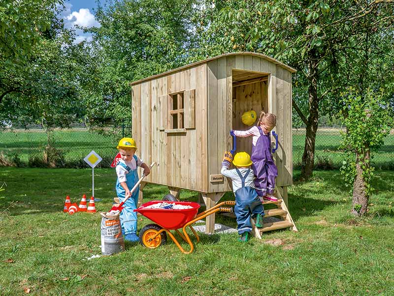 Betzold Bauwagen Betzold Bauwagen im Grünen mit 3 spielenden Kindern