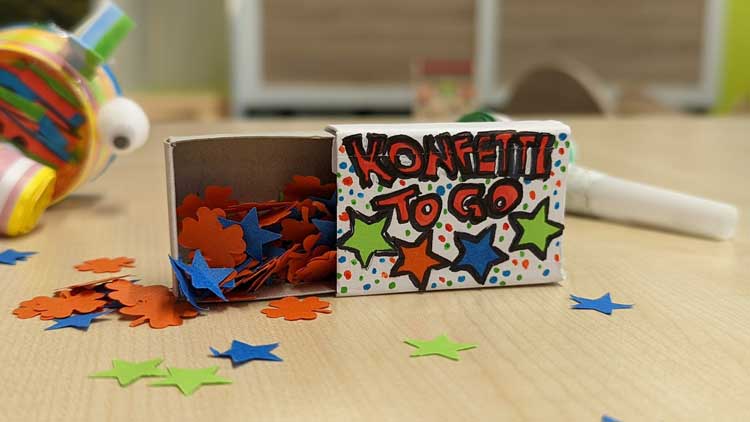 Eine kleine Streichholzschachtel mit großer Wirkung und viel Konfetti.