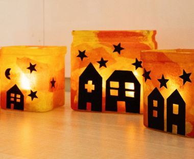 Lichterstadt orange leuchtende Windgläser mit Stadt-Motiv