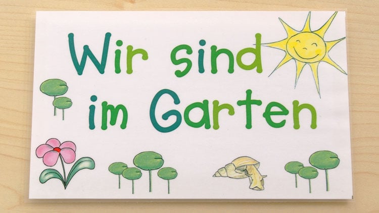 Laminiertes Schild - sind im Garten