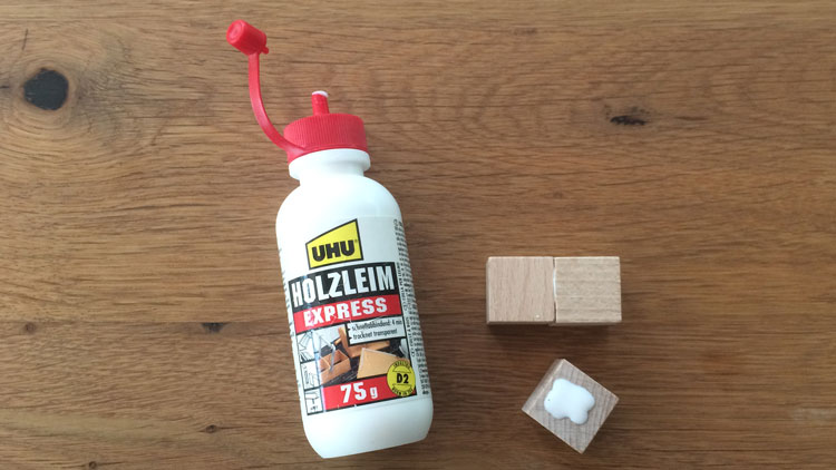 Holzleim und Holzklötzchen